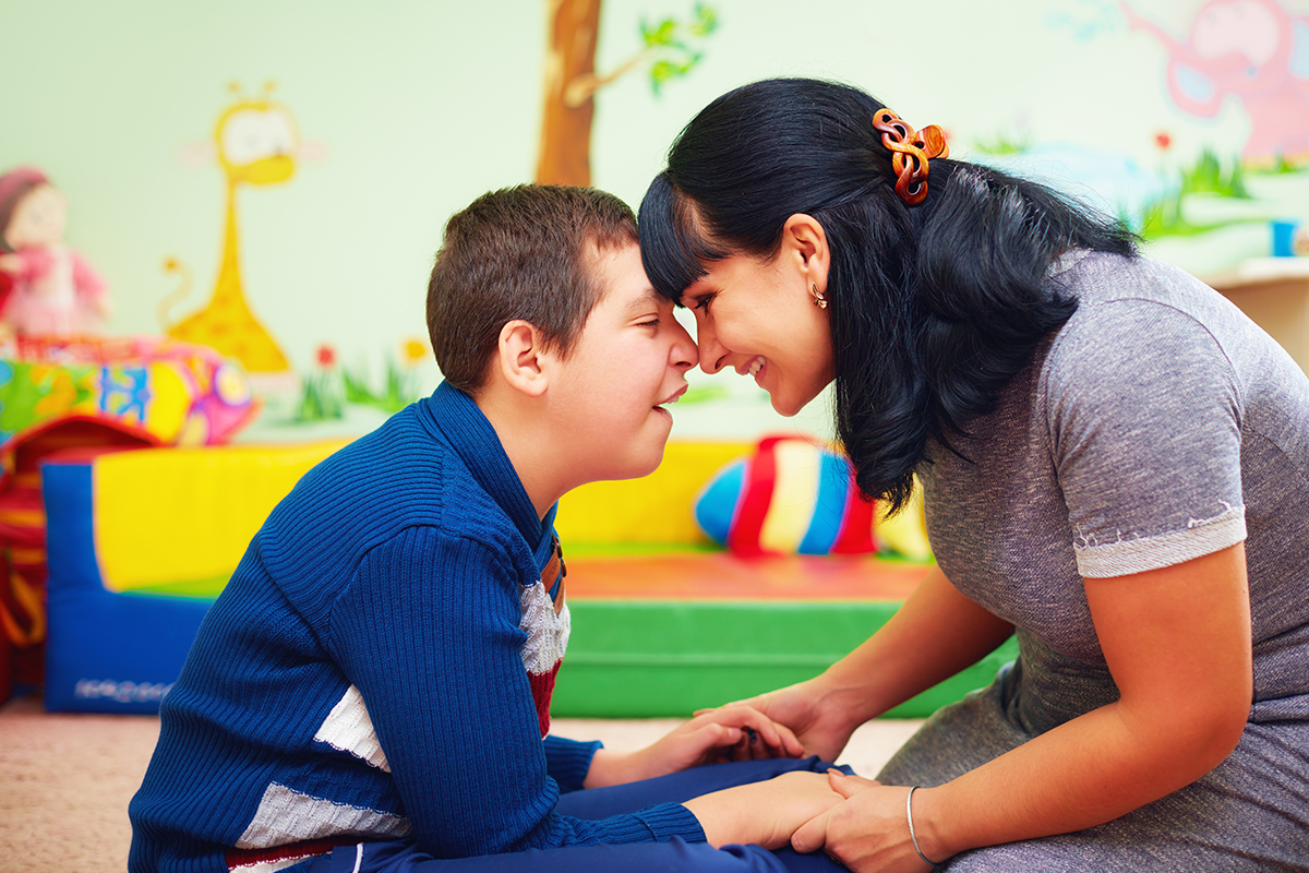 Unique Support for All Ages teacher witth student